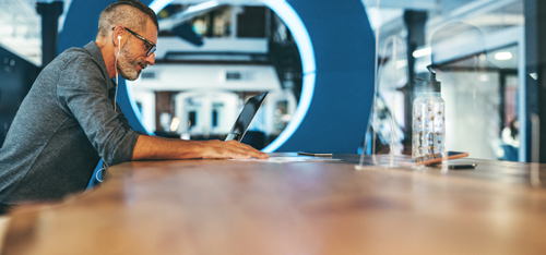 man working at laptop